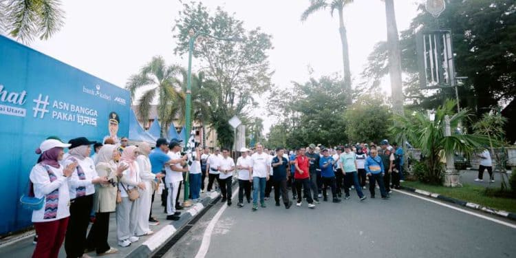 Gelar Jalan Sehat #ASNbanggapakaiQRIS, Bank Kalsel dan Pemkab HSU Dorong Peningkatan Transaksi Non Tunai